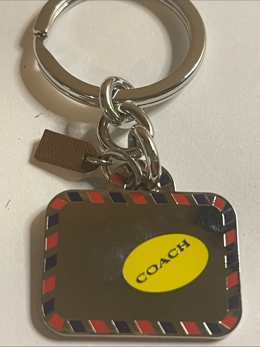 COACH Silver Bag Keychain and Coach Pen